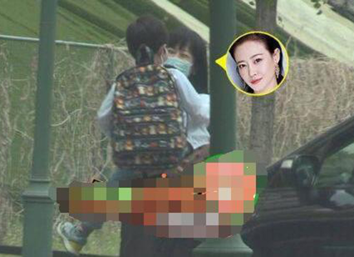 谭卓疑似隐婚生子 怀抱小男孩陌生男子轻拍其屁股