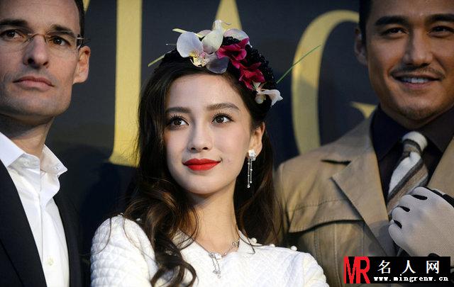 Angelababy戴花帽看马球赛 贵妇气质尽显(1)