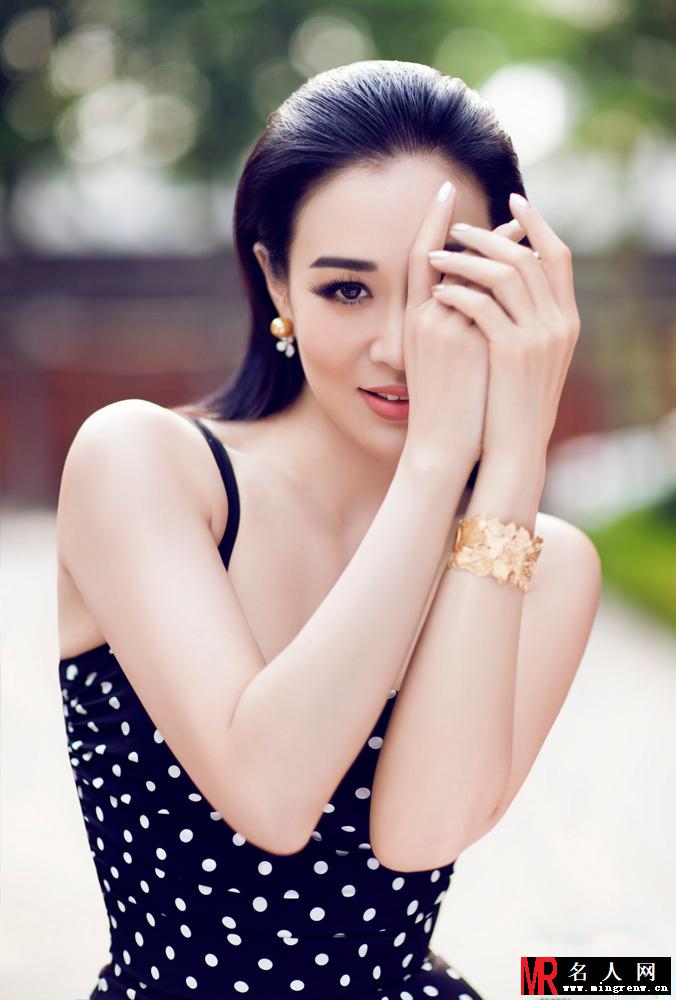 钟丽缇初秋写真 尽显辣妈风采(1)